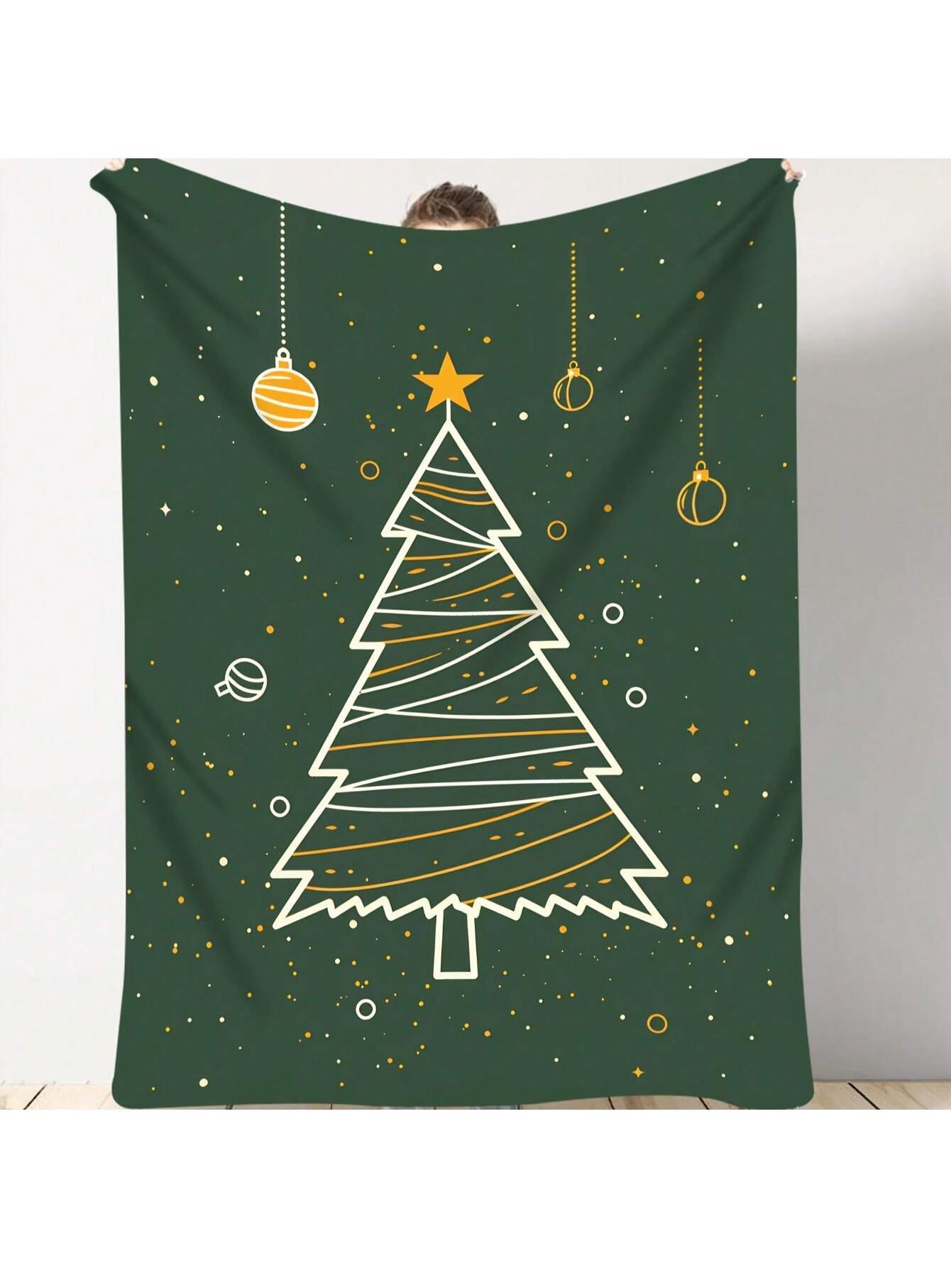 Wrap yourself in festive cheer with this cozy dark green flannel throw blanket, adorned with shimmering golden ornaments. Its soft plush fabric keeps you warm all year round, making it the perfect snuggle buddy for chilly nights or holiday movie marathons. Add a splash of holiday spirit to your home decor or gift it to someone who loves merry moments and comfy vibes!