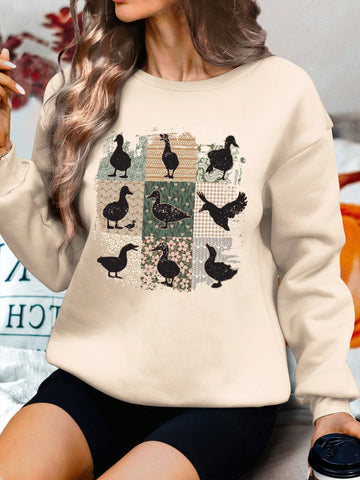 Embrace the farmhouse life with our Cozy Duck Floral Sweatshirt. Its loose fit offers ultimate comfort while the quirky duck and floral print adds a touch of whimsy. Perfect for cozy nights by the fire or a trip to the farmers market. (Quack up your wardrobe with our sweatshirt!)
