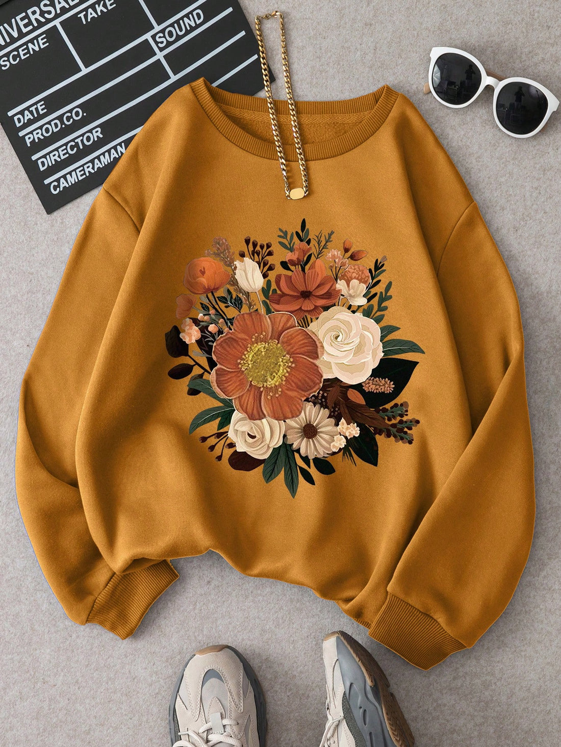 Stay effortlessly stylish and cozy this autumn with our Cozy Floral Oversized Sweatshirt. Featuring a unique floral design, this oversized sweatshirt is perfect for adding a touch of casual elegance to any outfit. Stay warm and comfortable while looking your best this season!