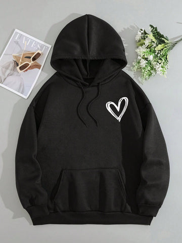 Get ready to snuggle up in style this winter with our Cozy Heart Print Thermal Hoodie! This plus size essential features a kangaroo pocket for added warmth and convenience. Perfect for chilly days, this hoodie will keep you cozy and looking cute. Don't sacrifice comfort for fashion this season!