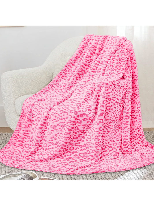 Introducing our Cozy Leopard Pink Flannel Blanket - the perfect addition to your living room or bedroom. Made with luxuriously soft and lightweight material, this blanket will keep you warm and cozy while adding a touch of style to any space. Topped with a playful leopard print, it's the perfect mix of comfort and fashion.