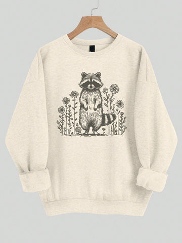 This Cozy Raccoon Floral Sweatshirt is the perfect addition to your spring and autumn wardrobe. With its casual and loose fit, it provides both comfort and style. The cute raccoon floral design adds a touch of playfulness to your outfit. Stay cozy and fashionable with this must-have sweatshirt.