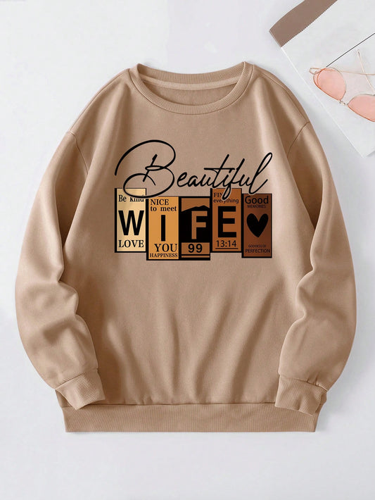 Stay warm and stylish with the Cozy & Trendy Thermal-Lined Sweatshirt. The thermal lining provides added warmth and the stylish letter graphic adds a trendy touch. Perfect for chilly days, this sweatshirt is comfortable and fashionable.