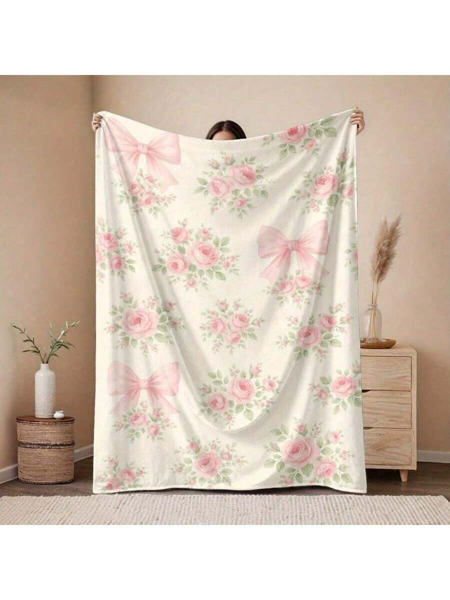 Wrap yourself in warmth and charm with this large flannel blanket featuring a delightful pink rose and bow design. Perfect for snuggling at home or adding a cozy touch to outdoor adventures, its soft fabric keeps you comfy and stylish wherever you go. Embrace comfort with a playful twist!