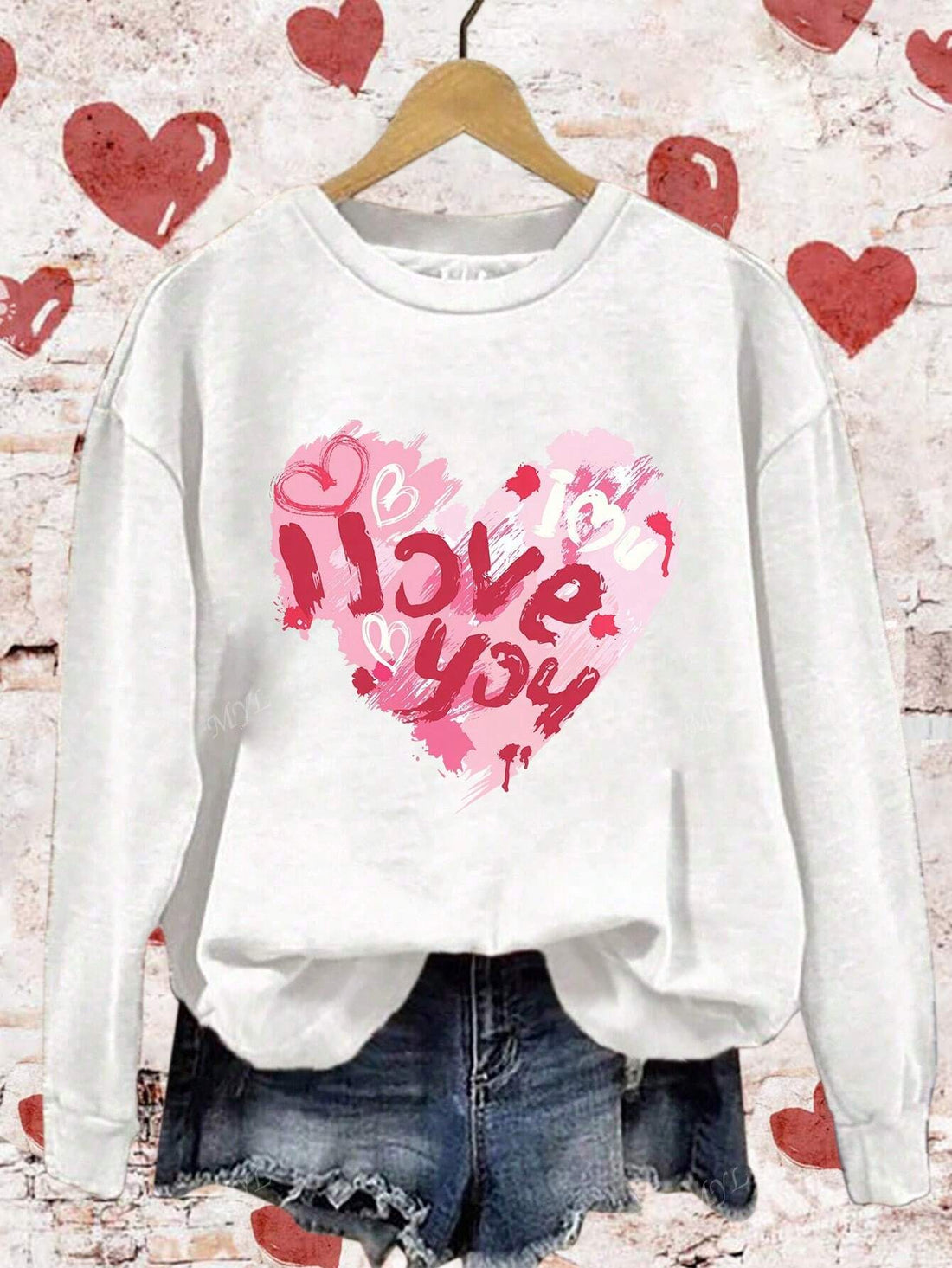 Get cozy in our Valentine's Heart Print Hoodie Sweatshirt. Perfect for chilly autumn and winter months, this hoodie will keep you warm and stylish. The heart print adds a touch of romance while the hoodie provides extra comfort. Show off your love for both fashion and Valentine's Day with this must-have sweatshirt.