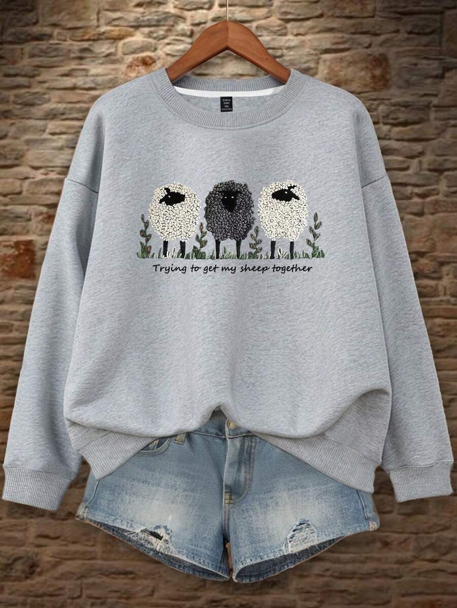 Snuggle up in style with this plus size women's pullover sweatshirt featuring an adorable sheep graphic. Perfect for chilly fall and winter days, it combines cozy warmth with a playful touch. Whether you're lounging at home or out for a casual stroll, this sweatshirt keeps you comfy and cute all season long.