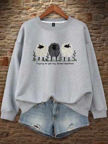 Snuggle up in style with this plus size women's pullover sweatshirt featuring an adorable sheep graphic. Perfect for chilly fall and winter days, it combines cozy warmth with a playful touch. Whether you're lounging at home or out for a casual stroll, this sweatshirt keeps you comfy and cute all season long.