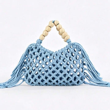 Light blue crochet mesh beach handbag with beige wooden bead handles open top and long tassel fringe on both sides