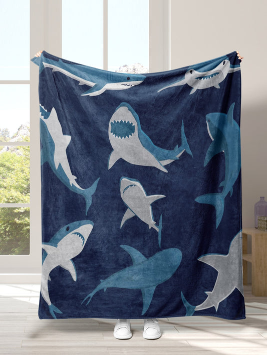 Introducing our Cuddle Up Shark Pattern Blanket - the perfect cozy addition to your home! Made with soft materials, this blanket is perfect for snuggling up on chilly nights. Its cute shark pattern adds a playful touch to any room. Stay warm and stylish with our must-have blanket.