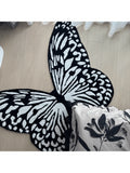 Add a touch of whimsy to any room with this adorable black and white butterfly velvet rug. Soft to the touch and featuring a non-slip backing, it’s perfect for brightening up your home or office while keeping you safe from slips. Let these charming butterflies flutter underfoot and bring playful style wherever you place it!