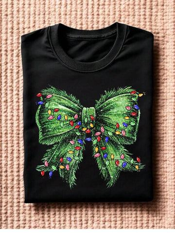 Celebrate the season in style with this Cute Christmas Bow T-Shirt! Featuring a charming festive bow adorned with twinkling Christmas lights, this playful tee adds a cheerful touch to your holiday wardrobe. Perfect for spreading joy at parties or cozy gatherings, it’s a fun and festive way to show your holiday spirit.