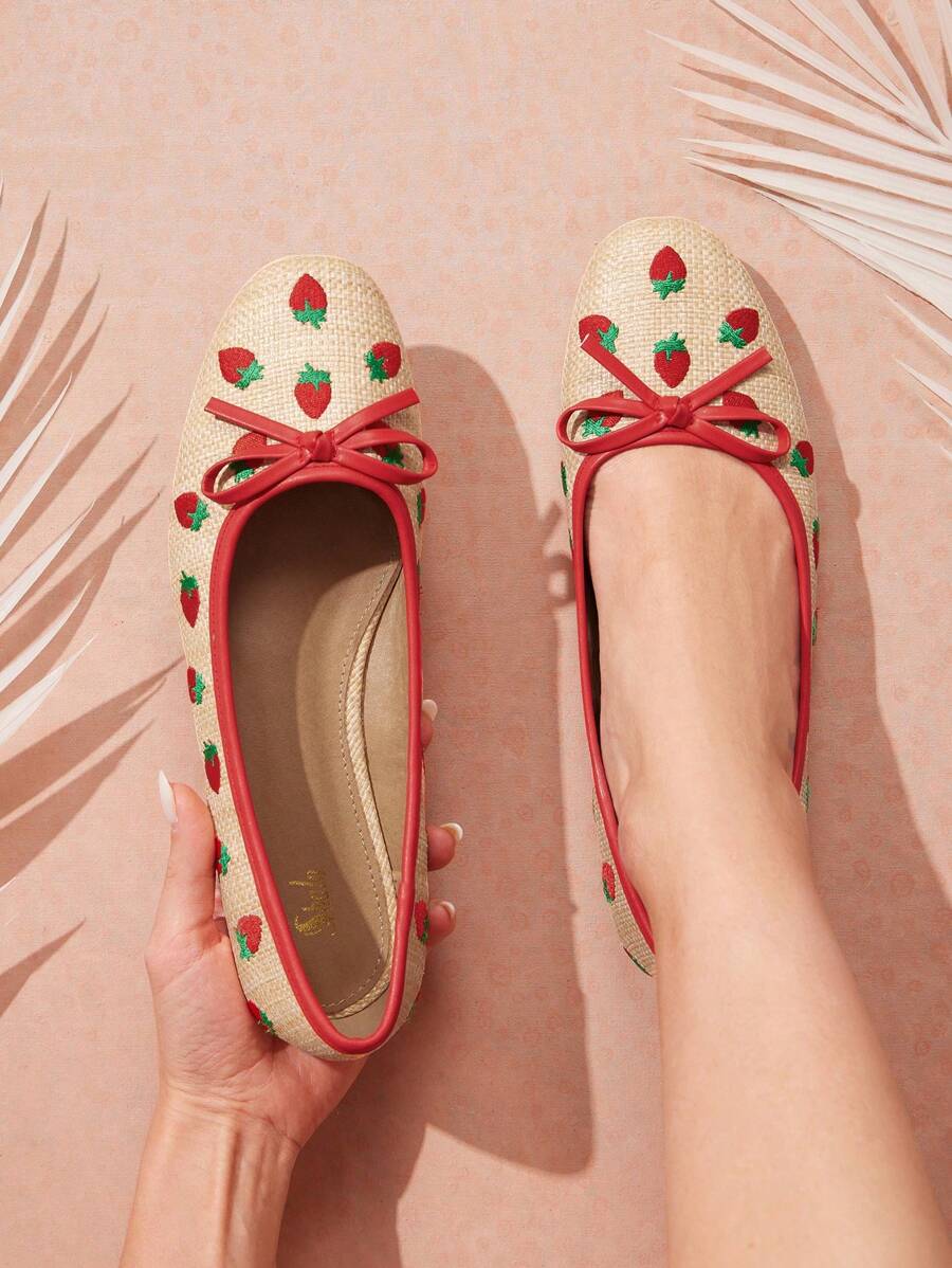 Step into summer style with these charming strawberry pattern pumps, designed for effortless beach vacation vibes. The playful bow detail and round toe silhouette offer a sweet, feminine touch, while the raffia and PU blend keeps your feet comfortable through sandy strolls and seaside adventures. Perfect for pairing with sundresses, linen shorts, or beachwear, these pumps bring a pop of fruity fun to your warm-weather wardrobe. Lightweight and easy to slip on, they're your go-to choice for casual elegance 