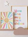 Brighten your little one's room with this charming sunshine canvas wall art. Featuring the heartwarming 