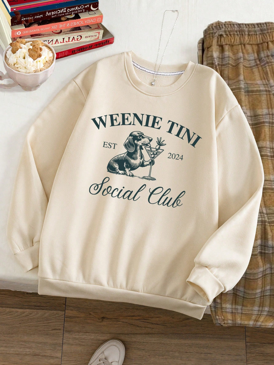 This Dachshund Delight sweatshirt is perfect for dog lovers! Show off your love for these adorable pups with a cute crewneck design. Made with high-quality material, it's both comfortable and stylish. A must-have for any dachshund enthusiast.