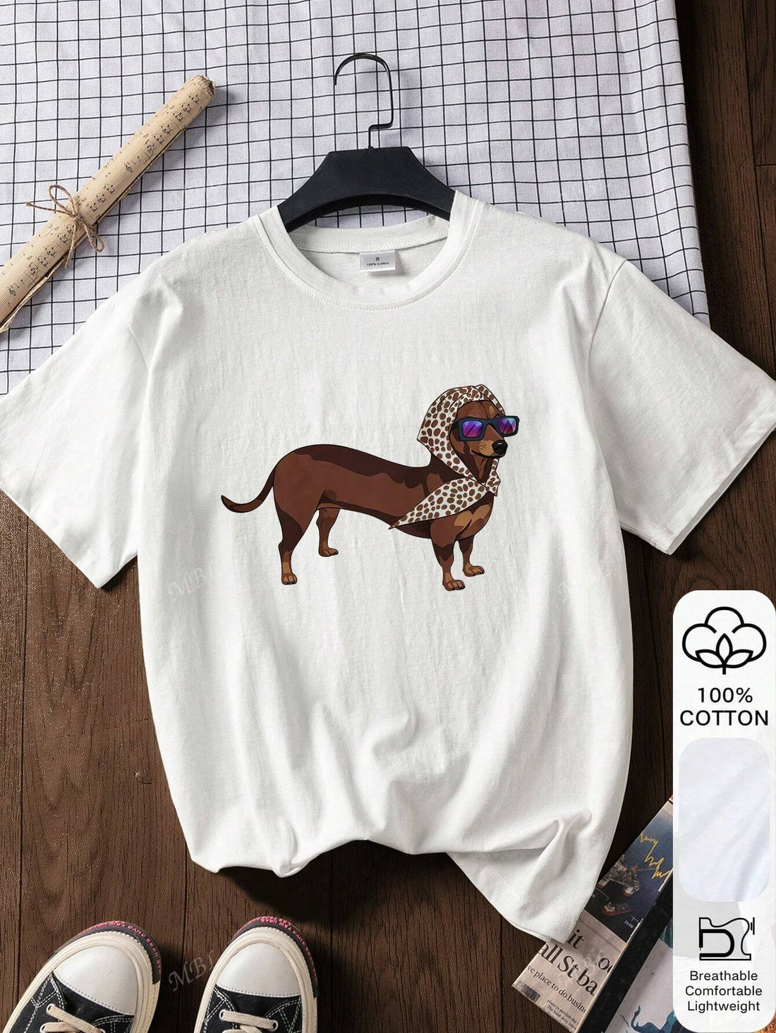 Embrace sunny days with the Dachshund Dreaming tee—a playful, loose-fit graphic t-shirt made from 100% soft cotton. Perfect for summer, it keeps you cool and comfy while showcasing your love for adorable dachshunds in style. Whether you're out for a stroll or lounging at home, this shirt adds a fun, carefree vibe to your wardrobe.