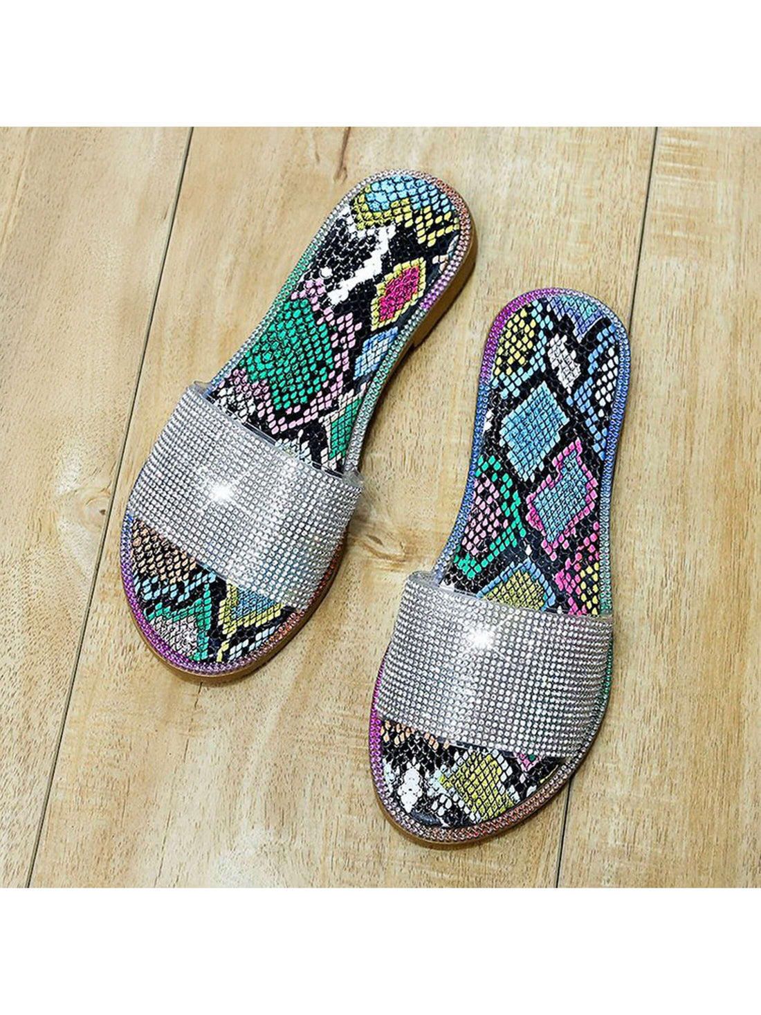 Experience the ultimate in comfort and style this summer with our Dazzling Diamond Comfort Slippers. With a sparkling design and luxurious diamond pattern, these slippers are sure to turn heads. Perfect for lounging at home or running errands, these slippers offer both fashion and function. Treat your feet and elevate your summer wardrobe today.