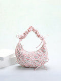 Expertly crafted for both style and convenience, our Ditsy Floral Dumpling Handbag is the perfect addition to any fashion-forward wardrobe. Made in the popular Korean fashion style, this shoulder bag features a beautiful bowknot decoration that adds a touch of elegance to your everyday look. Practical and chic, this handbag is a must-have accessory for any fashion lover.