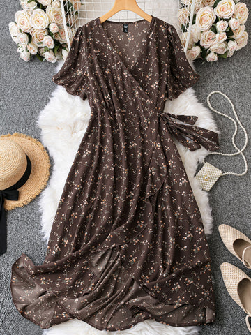 Introducing our Ditsy Floral Print Butterfly Sleeve Maxi Dress! With a playful print and fluttery butterfly sleeves, this dress is perfect for any occasion. The ruffle trim and knot detail add a touch of whimsy to this already charming piece. Get ready to turn heads and make a statement in this dress!