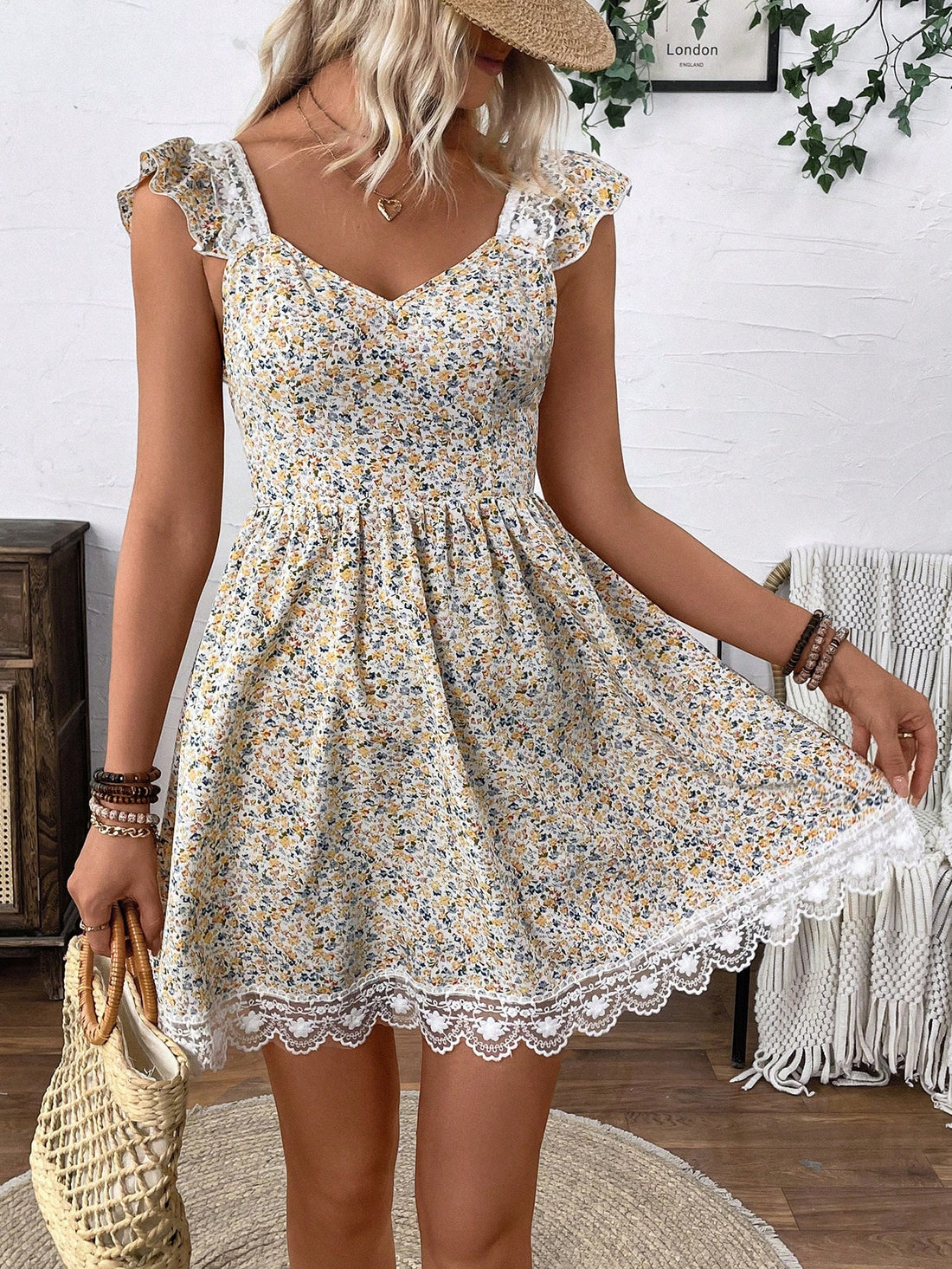 Effortlessly exude spring elegance in our Ditsy Floral Tie Backless Ruffle Trim Contrast Lace Dress. With its playful tie and backless design, this dress is perfect for any occasion. The ditsy floral print adds a touch of whimsy, while the contrast lace details elevate the look. Stay chic and stylish this season.