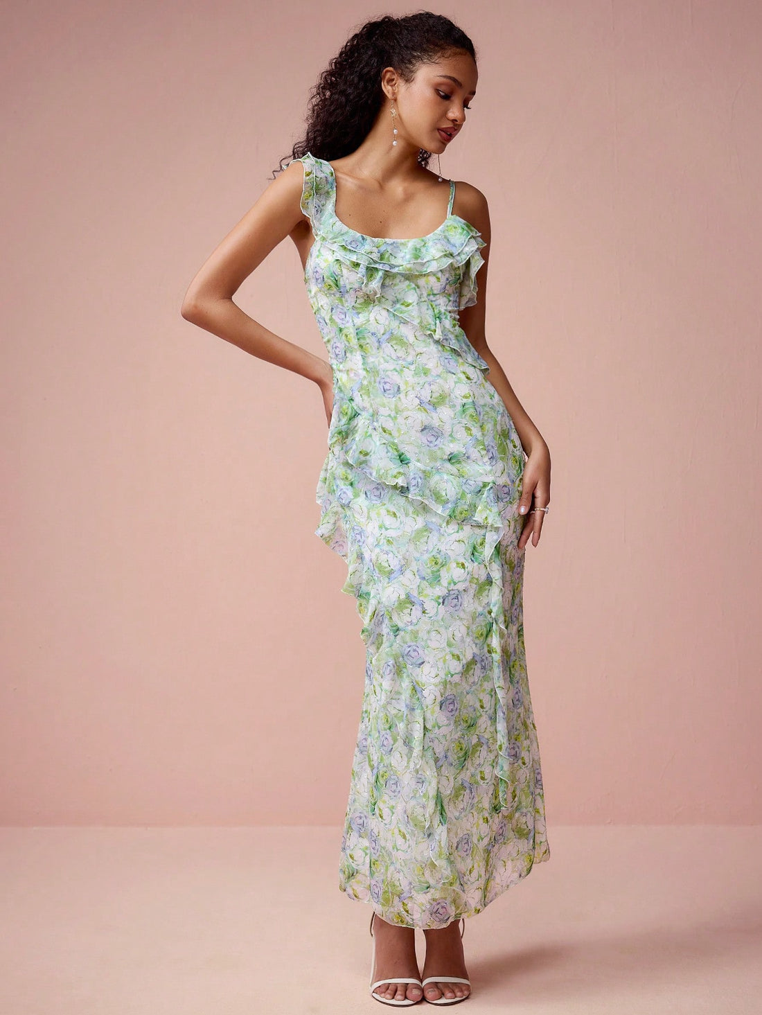 Make a stylish splash at your next event with our Dreamy Floral Mermaid Maxi Dress. The elegant ruffle suspenders add a touch of whimsy while the flowy fit flatters any figure. Perfect for spring and summer, this dress will bring a touch of floral elegance to your wardrobe.