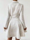 Back view of ivory windowpane plaid blazer mini dress with fitted waist and flared skirt