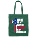 Front view of forest green cotton canvas tote bag with distressed patriotic cross and faith message