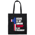 Front view of black cotton canvas tote bag with distressed patriotic cross and faith message