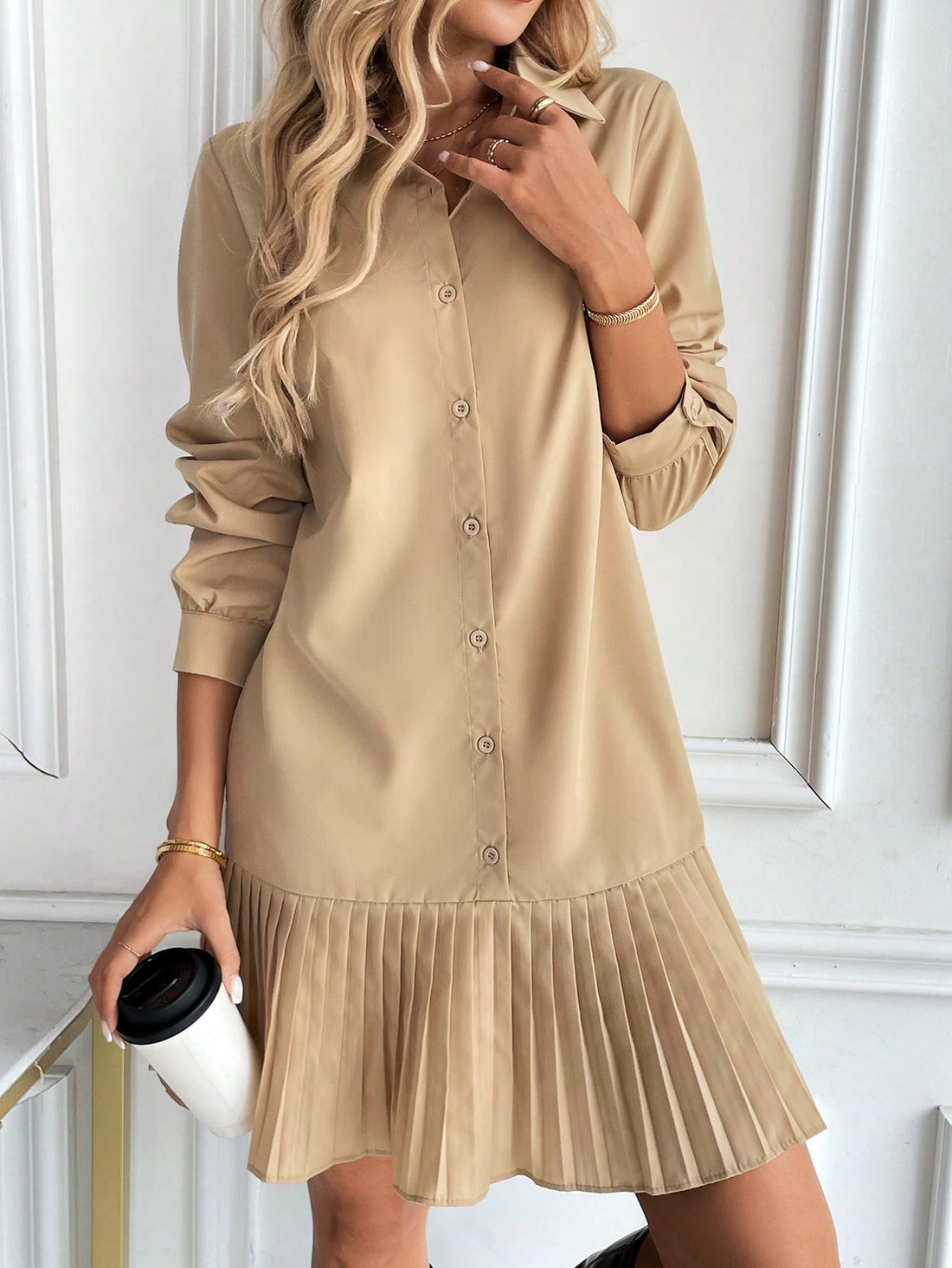 Look effortlessly elegant in this Casual Button-Up Shirt Dress with Foldable Collar. Made to make dressing up a breeze, this dress combines style and convenience with its button-up design and foldable collar. Perfect for any occasion, this dress adds a touch of versatility to your wardrobe.