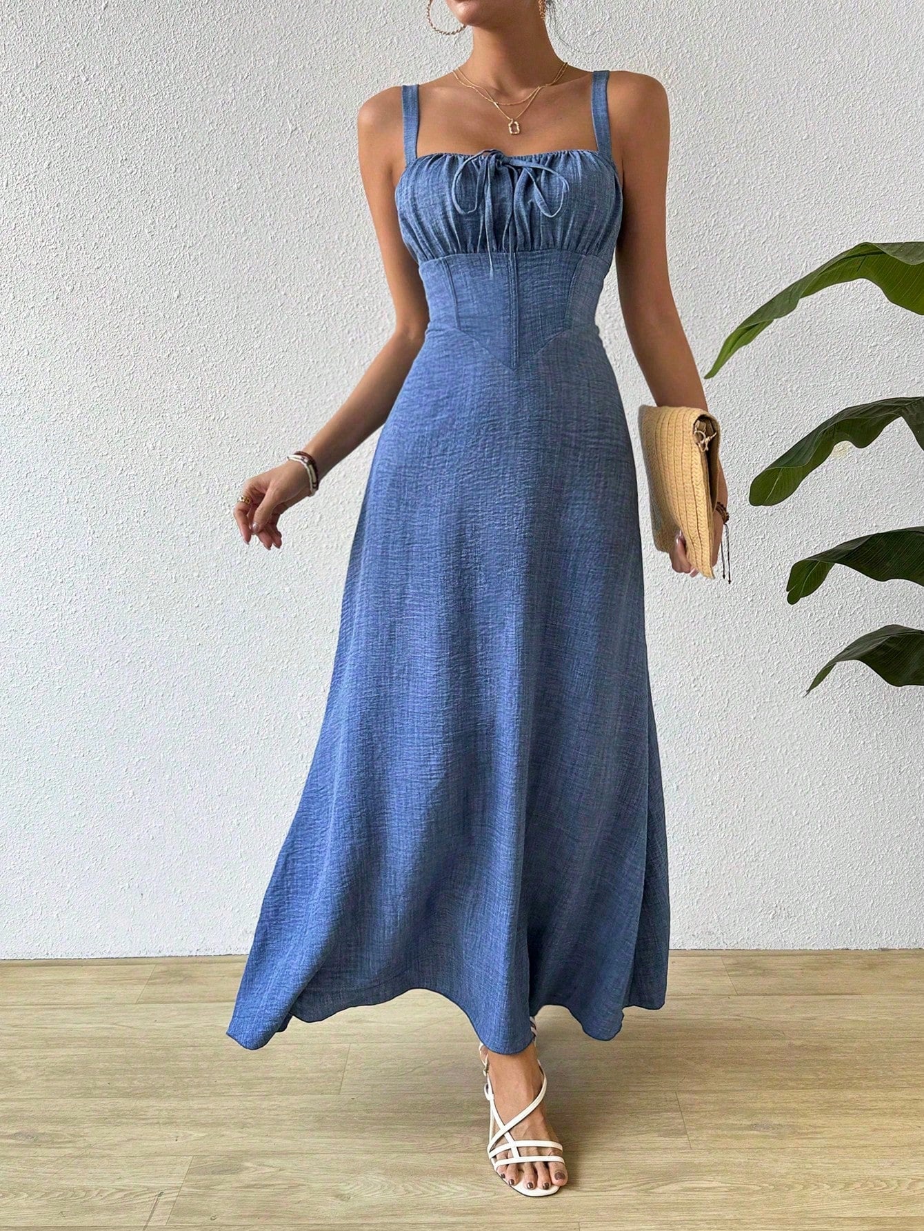 Effortlessly elegant, this maxi cami dress is perfect for stylish beach getaways. Featuring a pleated bust for a touch of sophistication, this dress provides effortless style and comfort. Enjoy the ease of dressing up without the fuss. Perfect for your next getaway!