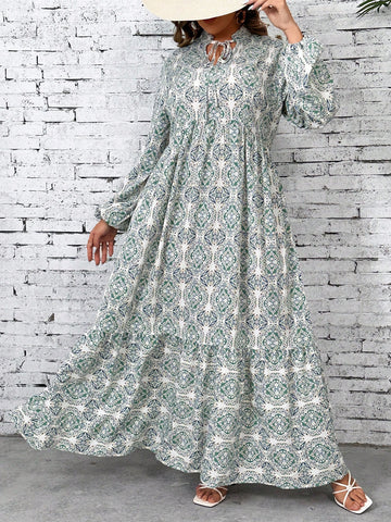 Upgrade your wardrobe with our Effortless Elegance: Plus Size Casual Allover Print Lantern Sleeve Long Dress. Made for comfort and style, enjoy the flowy silhouette and eye-catching print. Perfect for any occasion, you'll effortlessly stand out in this elegant dress.