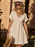 Introducing the perfect blend of effortless elegance and playful vacation vibes with our V-Neck Ruffle Trim Dress. This must-have piece for Spring/Summer will have you feeling fabulous and carefree. With its flattering silhouette and trendy ruffle accents, this dress is the perfect choice for any casual occasion. (Effortless style, playful vacation vibes, flattering silhouette, trendy ruffle accents.)