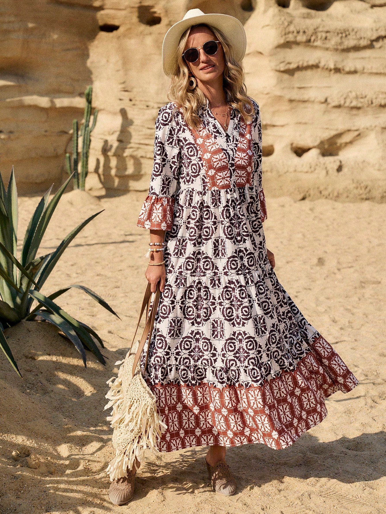Get ready to escape this summer in style with our Effortless Elegance Printed Flare Sleeve Midi Dress! Featuring a unique print and flattering flare sleeves, this dress will effortlessly elevate your summer wardrobe. Perfect for any casual occasion, it's the ultimate combination of elegance and ease.