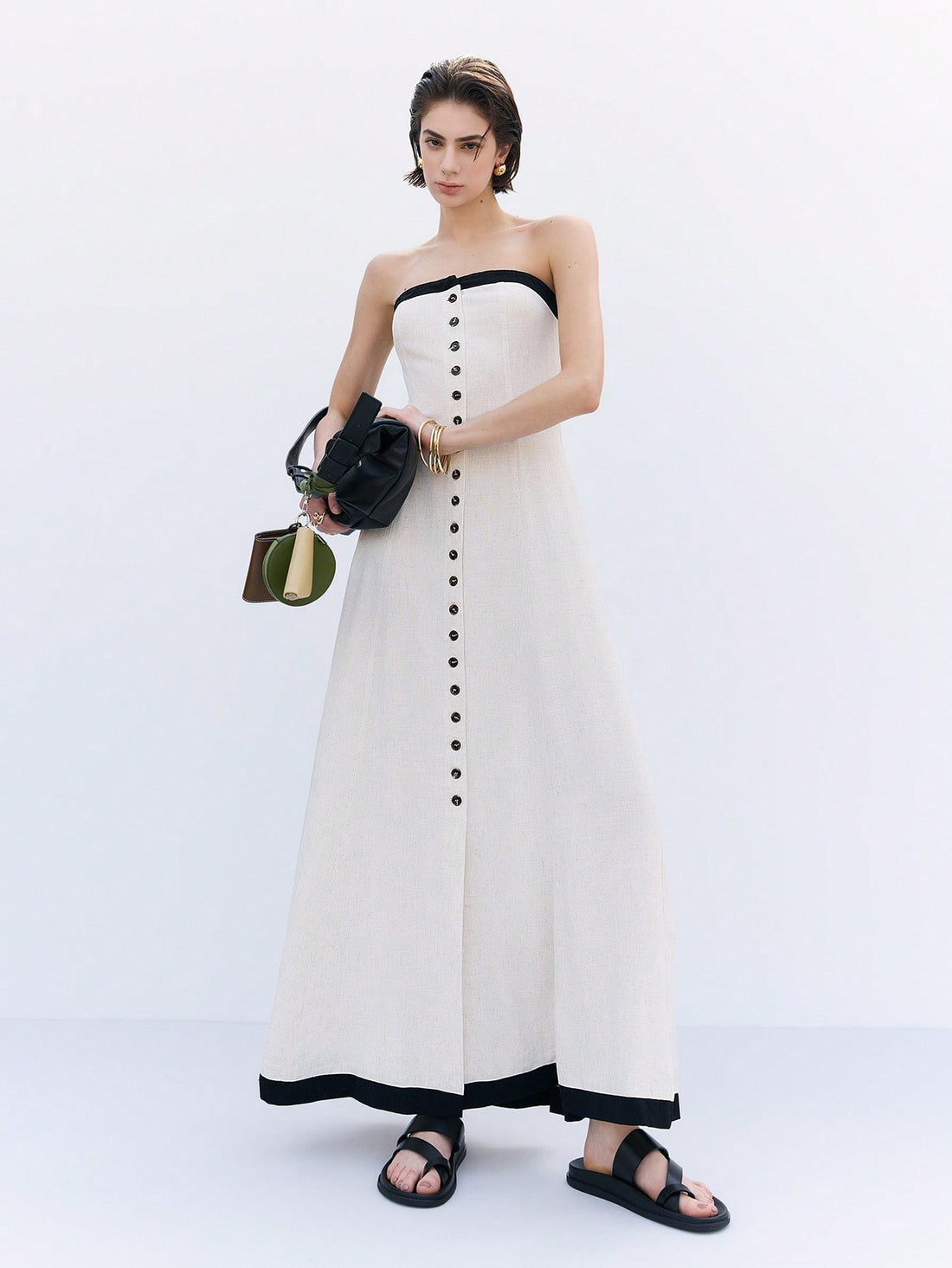 Breeze through your spring and summer getaways in this playful sleeveless linen maxi dress. Featuring charming patchwork details, it blends comfort and style effortlessly, keeping you cool and chic from beach strolls to sunset dinners. Embrace easy elegance wherever your vacation takes you!