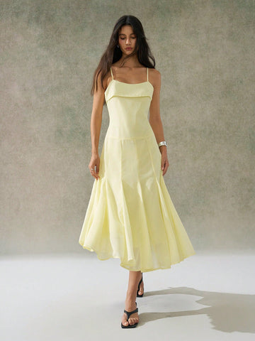 Step into sunshine and smiles with this playful spaghetti strap dress designed for effortless elegance. Its solid color and breezy fit make it your go-to for casual days when comfort meets charm. Whether you're strolling the park or sipping iced tea with friends, this dress keeps things light, bright, and beautifully simple.