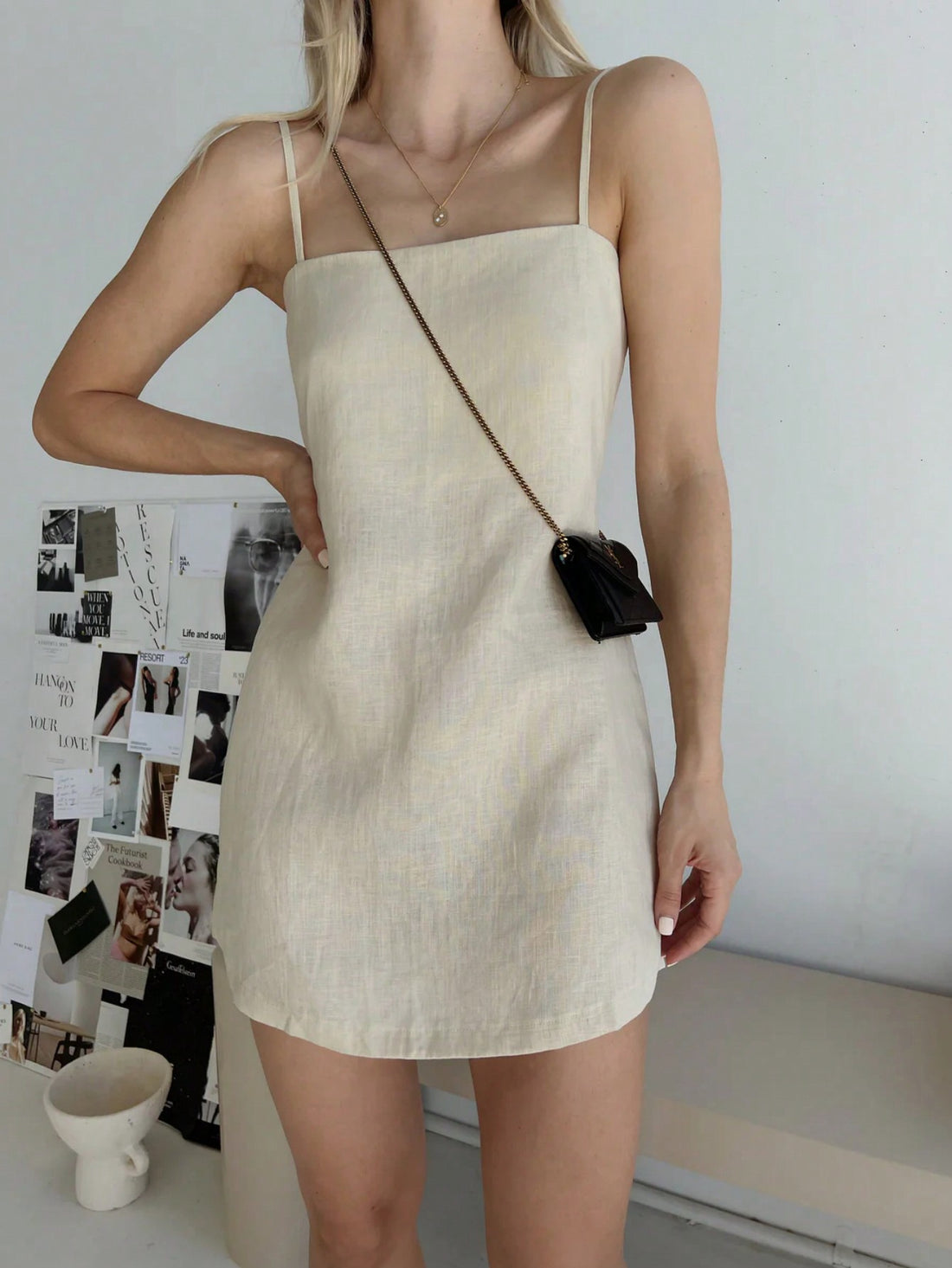 This mini dress from Effortless Elegance is the perfect summer staple. With its delicate spaghetti straps and flowy design, it exudes effortless elegance. Made with high-quality materials, it provides comfort and style for any occasion. Embrace chic, feminine fashion with this must-have dress.