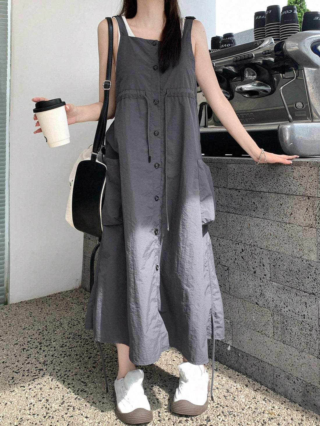 Achieve effortless summer style with this women's strappy solid color overall dress. Button details add a touch of charm while convenient side pockets offer functionality. Perfect for a casual day out or a fun event. (No more boring dresses!)