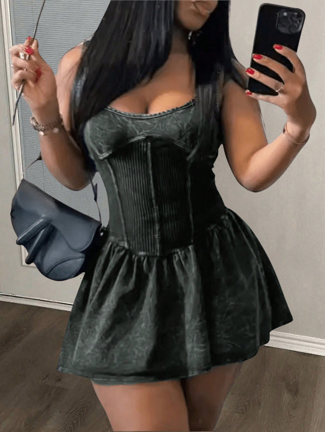 Get ready to turn heads with our Effortlessly Chic mini dress! With its black washed print and ruched, flared design, this sleeveless dress will have you feeling confident and looking fabulous. Perfect for any occasion, this dress is the epitome of effortless style.