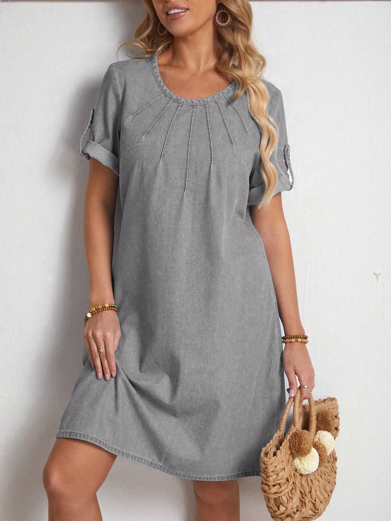 Effortlessly achieve a stylish and casual look with our Effortlessly Chic Denim Dress. Featuring roll-up sleeves, this solid dress offers a comfortable and chic option for any occasion. Made with high-quality denim, it's perfect for your everyday wardrobe. Upgrade your fashion game with this must-have piece.