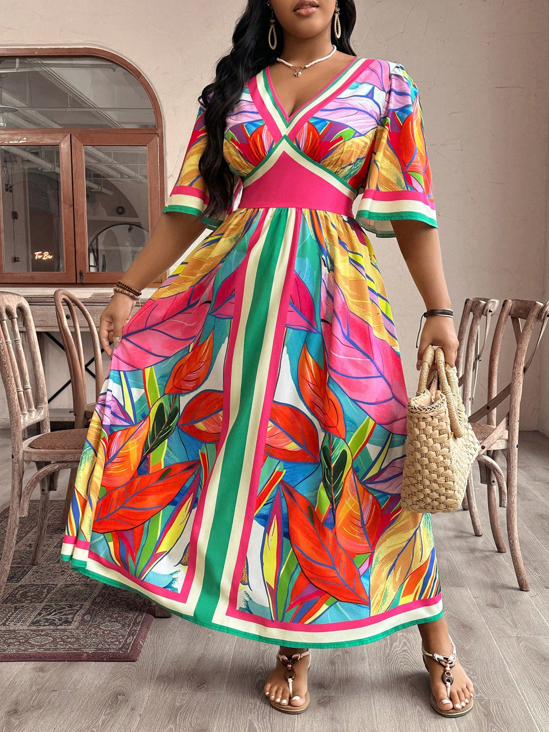 Introducing the perfect dress for your next vacation: our Effortlessly Chic high-waisted dress with a fun plant print in plus sizes. Look stylish without sacrificing comfort!