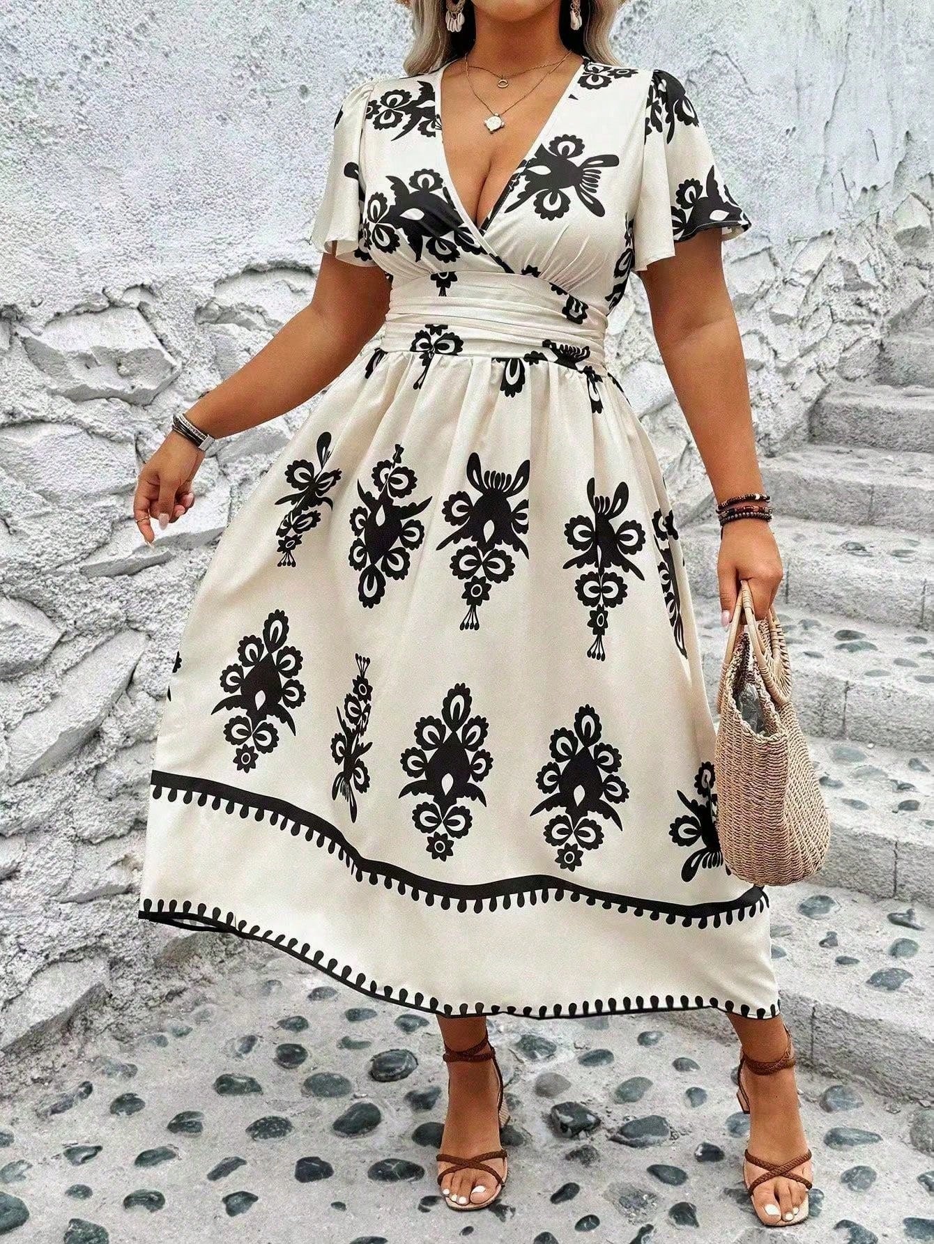 Be effortlessly chic this summer in our Plus Size Printed V-Neck Maxi Dress. The cinched waist will highlight your curves and the vibrant print adds a playful touch. You'll stay cool and stylish in this must-have dress!