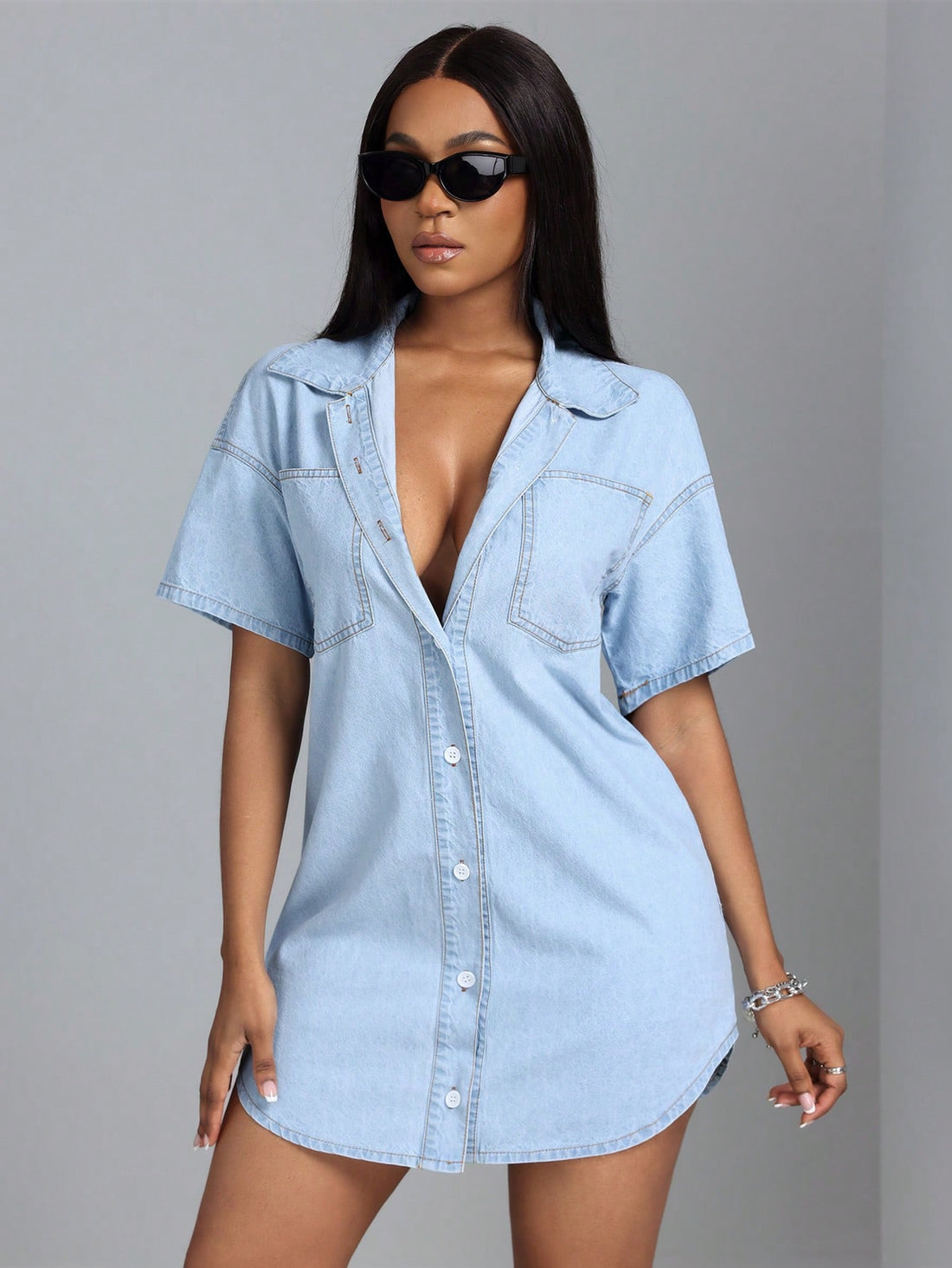 Effortlessly elevate your daily look with our Simple Solid Color Denim Dress. Crafted with a chic and timeless design, this dress is perfect for all your daily activities. Made with high-quality denim fabric, it offers both style and comfort. Upgrade your wardrobe with this must-have piece.