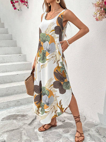 Embrace effortless summer style with this sleeveless tropical print dress. Crafted from 100% viscose woven fabric, it features a flattering scoop neckline, asymmetrical wrap design, and backless silhouette for a breezy boho aesthetic. The mid-rise waist and long asymmetrical hem create a graceful drape, while functional pockets add everyday practicality. Semi-sheer and unlined, this multicolor piece transitions seamlessly from beach days to casual outings. Machine washable for easy care.