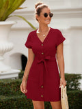 Get ready to slay at your next holiday party with this Effortlessly Chic dress! The solid color and front buttons exude elegance, while the double pockets add a touch of practicality. Ideal for any holiday celebration, this dress is perfect for the modern fashionista who wants to make a statement without sacrificing comfort.