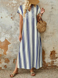 Get ready for a stylish vacation with our Effortlessly Chic Vertical Stripe V-Neck Maxi Dress! This dress features a flattering v-neckline and a vertical stripe design that will make you stand out from the crowd. Perfect for any vacation, this dress effortlessly combines fashion with comfort. (Dress only, vacation not included!)