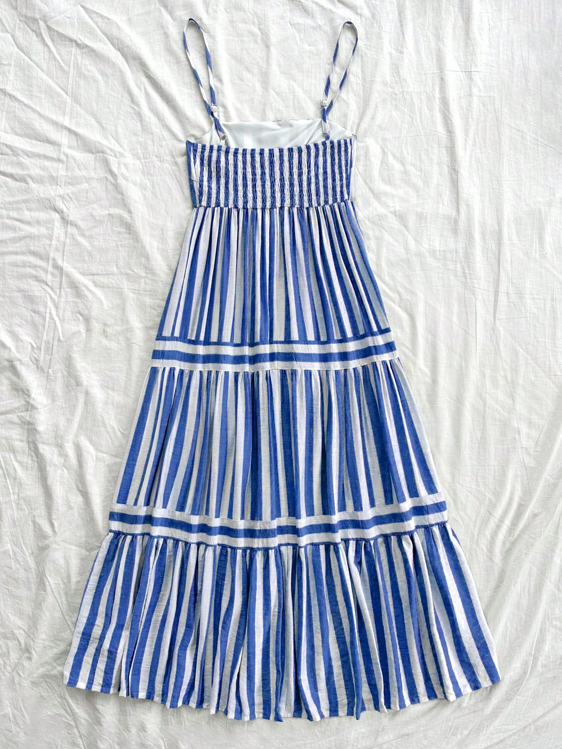 Effortlessly elevate your summer style with our women's striped A-line dress. Perfect for vacations and special occasions, this dress exudes effortless elegance. With its flattering A-line silhouette and chic striped design, you'll look and feel your best. Don't miss out - grab yours now!