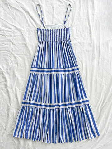 Effortlessly elevate your summer style with our women's striped A-line dress. Perfect for vacations and special occasions, this dress exudes effortless elegance. With its flattering A-line silhouette and chic striped design, you'll look and feel your best. Don't miss out - grab yours now!