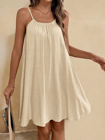 Effortlessly elevate your summer style with this flowy cami sundress. With a boho-inspired design, this babydoll dress is perfect for any occasion. Stay cool and chic all season long in this effortlessly elegant piece.