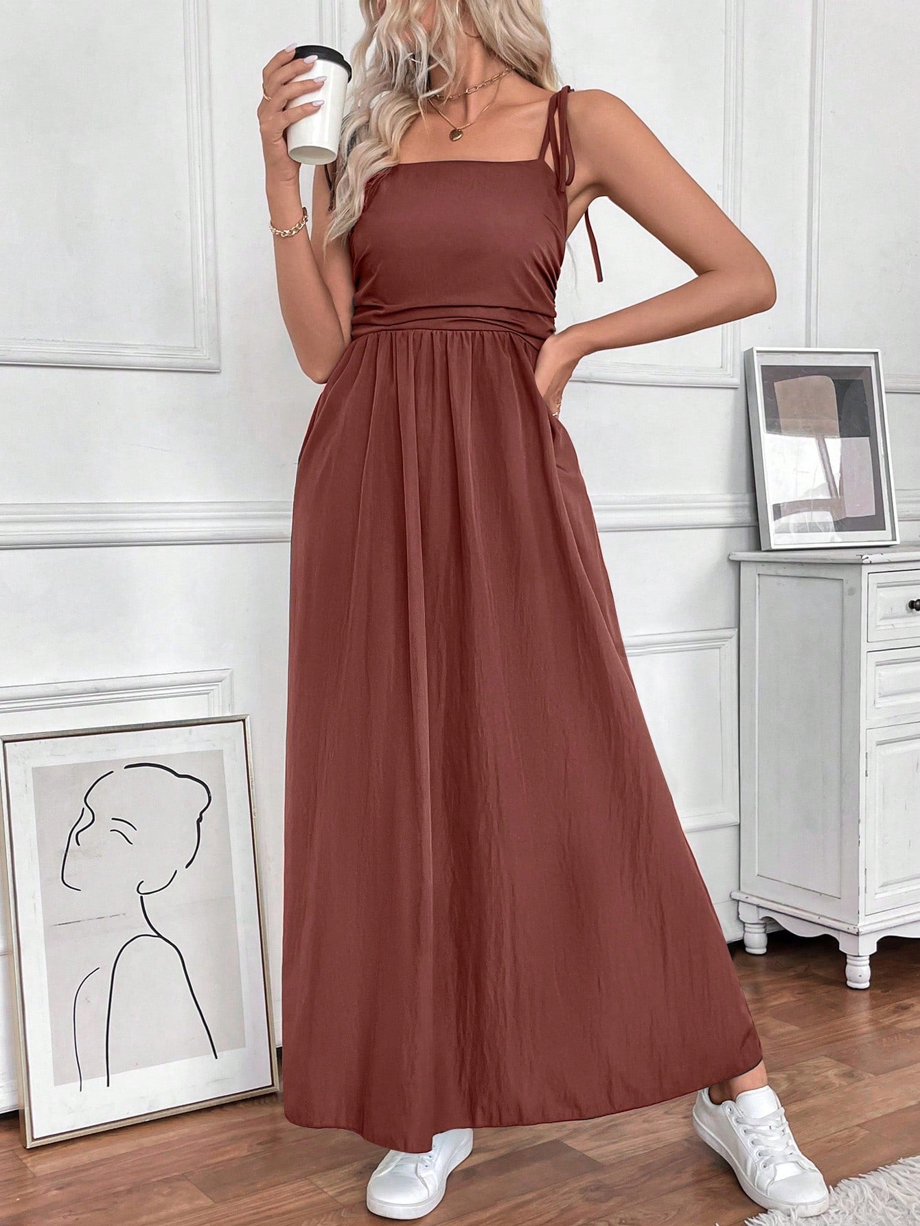 Be effortlessly stylish this summer with our sleeveless dress. Solid colors and pockets add a touch of convenience and chicness to your wardrobe. Grab yours now!