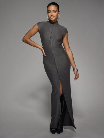 Step out in style with the Elegan Button-Down Maxi Dress. This sleeveless gown features a daring split and button-down front, perfect for turning heads at weddings or lively parties. Its flowing silhouette combines comfort and flair, making every move feel effortlessly chic and fun. Embrace elegance with a cheeky twist!