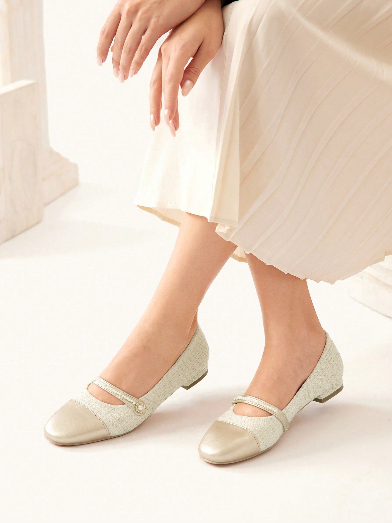 Experience the perfect blend of elegance and comfort with our Pearl-Decorated Flat Shoes for Women. Crafted with pearls for a touch of sophistication, these flats offer all-day comfort with their flat sole design. Elevate any outfit with these stylish and practical shoes.